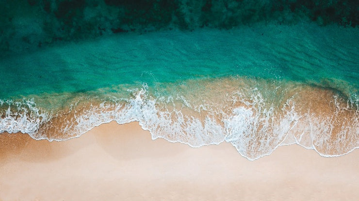 beautiful beach and ocean representing our mission of plastic free ocean | Lumiere Paris